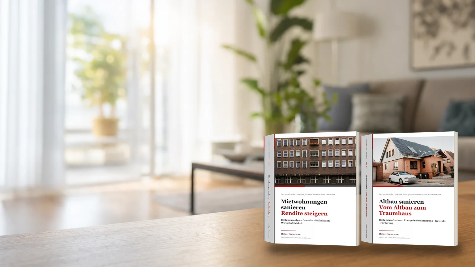 Beide Bände der Fachbuchreihe „Sanieren mit System“ auf einem Tisch im Wohnzimmer